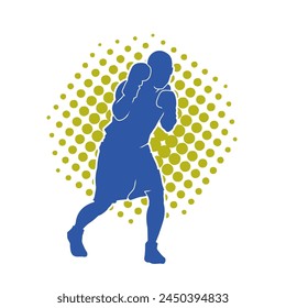 Silhouette of male boxing athlete in action pose. Silhouette of a muscular man wearing boxing gloves for boxing sport.