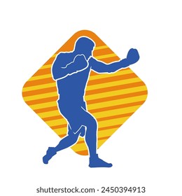 Silhouette of male boxing athlete in action pose. Silhouette of a muscular man wearing boxing gloves for boxing sport.