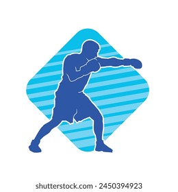 Silhouette of male boxing athlete in action pose. Silhouette of a muscular man wearing boxing gloves for boxing sport.