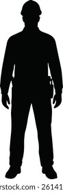 Silhouette of male construction worker in hard hat and tool belt standing in confident pose