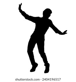 Silhouette of a male dancer in action pose. Silhouette of a slim man in dancing pose.