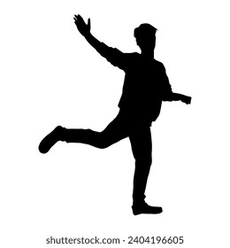 Silhouette of a male dancer in action pose. Silhouette of a slim man in dancing pose.