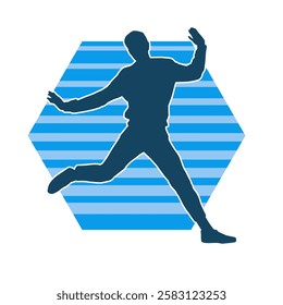 Silhouette of a male dancer in action pose. Silhouette of a slim man in dancing pose.