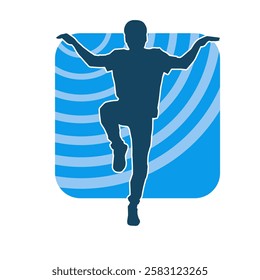 Silhouette of a male dancer in action pose. Silhouette of a slim man in dancing pose.