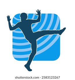 Silhouette of a male dancer in action pose. Silhouette of a slim man in dancing pose.