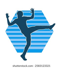 Silhouette of a male dancer in action pose. Silhouette of a slim man in dancing pose.