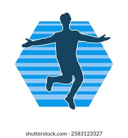 Silhouette of a male dancer in action pose. Silhouette of a slim man in dancing pose.