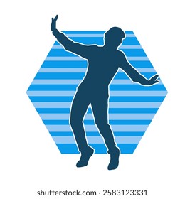 Silhouette of a male dancer in action pose. Silhouette of a slim man in dancing pose.