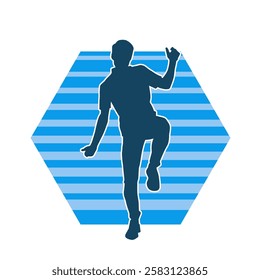 Silhouette of a male dancer in action pose. Silhouette of a slim man in dancing pose.