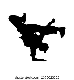 Silhouette of a male dancer doing hand stand pose. Silhouette of a man dancing pose.