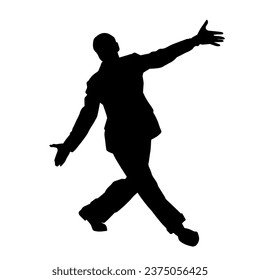 Silhouette of a male dancer in performing pose. Silhouette of a dancing man.