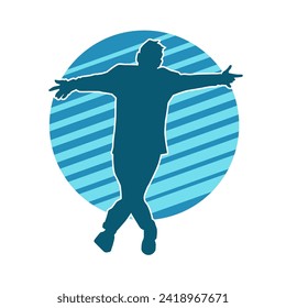 Silhouette of a male dancer in performing pose. Silhouette of a dancing man.