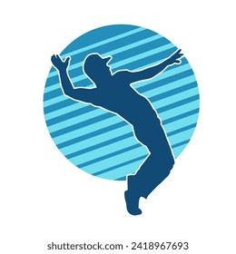 Silhouette of a male dancer in performing pose. Silhouette of a dancing man.