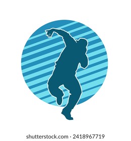 Silhouette of a male dancer in performing pose. Silhouette of a dancing man.