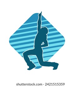 Silhouette of a male dancer in performing pose. Silhouette of a dancing man.