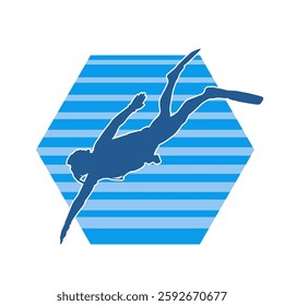 Silhouette of a male diver swimming pose underwater. Silhouette of a man in action pose doing diving sport.