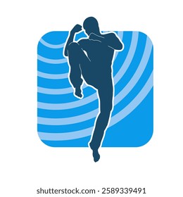 Silhouette of a male doing martial art kick pose. Silhouette of a martial art male doing kicking pose.