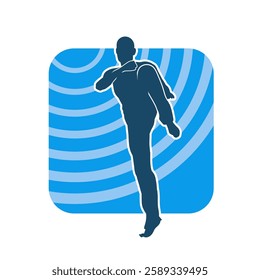 Silhouette of a male doing martial art kick pose. Silhouette of a martial art male doing kicking pose.