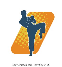 Silhouette of a male doing martial art kick pose. Silhouette of a martial art male doing kicking pose.