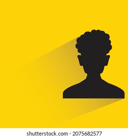 silhouette male face with drop shadow on yellow background