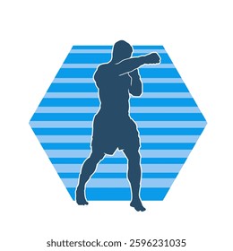 Silhouette of a male kickboxer athlete in action pose. Silhouette of a sporty man doing kicking pose.