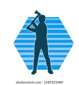 silhouette of a male lumberjack holding broad axe tool. silhouette of a forest worker standing ang holding a tomahawk.