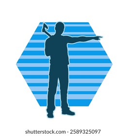 silhouette of a male lumberjack holding broad axe tool. silhouette of a forest worker standing ang holding a tomahawk.