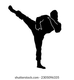 Silhouette of a male martial art person wearing ninja costume in kicking pose.