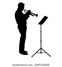 Silhouette of a male musician playing trumpet musical instrument. 