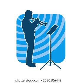 Silhouette of a male musician playing trumpet musical instrument. 