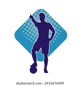 Silhouette of a male soccer player in steady pose. Silhouette of a football player in action pose.