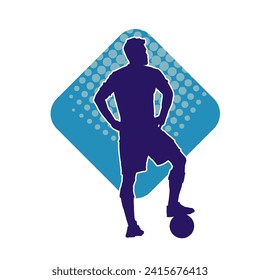 Silhouette of a male soccer player in steady pose. Silhouette of a football player in action pose.