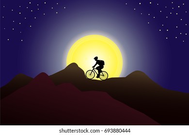 Silhouette of a man with a back pack riding the bicycle in the mountains against huge moon and starry sky