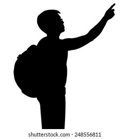 Silhouette man with backpack and hand point