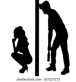 Silhouette of a man with a beer bottle, drunk man and sad worried woman