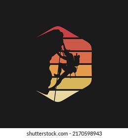 Silhouette Man climbing on a cliff graphic vector.