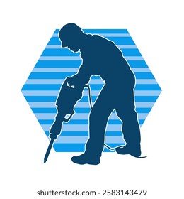 Silhouette of man in construction worker costume carrying drill power tool. Silhouette of construction worker male in action pose with power tool driller. 