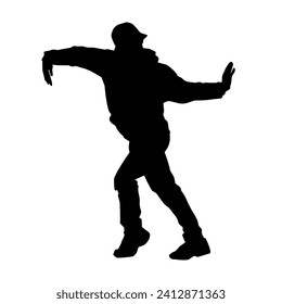 Silhouette of a man in dancing pose. Silhouette of a male dancer in performing pose.