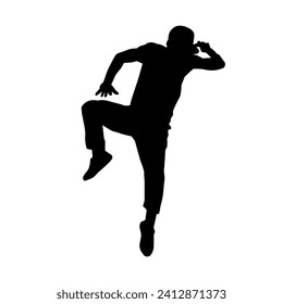 Silhouette of a man in dancing pose. Silhouette of a male dancer in performing pose.