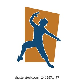 Silhouette of a man in dancing pose. Silhouette of a male dancer in performing pose.