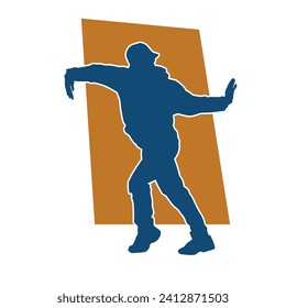 Silhouette of a man in dancing pose. Silhouette of a male dancer in performing pose.