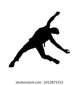 Silhouette of a man in dancing pose. Silhouette of a male dancer in performing pose.