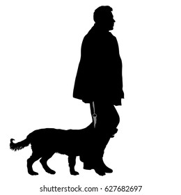Silhouette of man and dog on a white background.