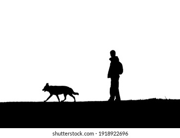 Silhouette de un hombre y un perro caminando sobre un acantilado.