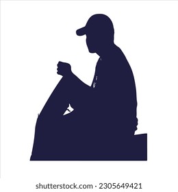 Silhouette eines Mannes in einem Hut sitzend
