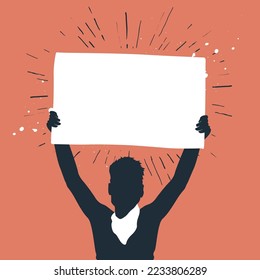 Silhouette Of Man Holding Protest Sign