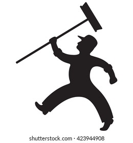 Silhouette Of Man Holding Push Broom