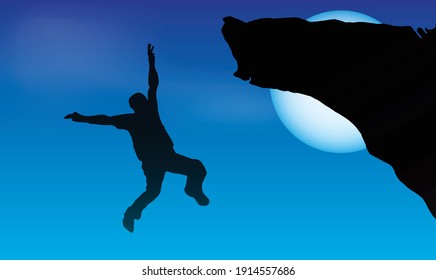 Silhouette of a man jumping or falling in the night