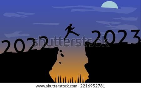 Silhouette of man jumping on cliff 2022 to cliff 2023 as moon appears on amazing night. New Year's concept. Symbol of starting and welcoming the new year 2023. People entering the year 2023, creative 