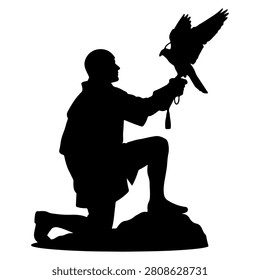 Silhouette of a man kneeling with a bird perched on his hand, capturing a moment of connection and harmony between human and nature.